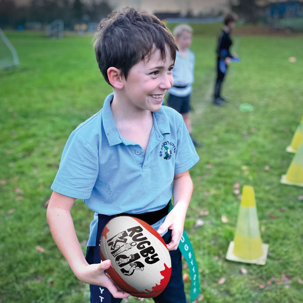 Boy taking part in a RugbyKids class